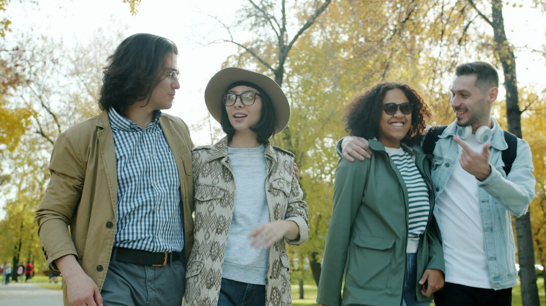 group of friends talking positively